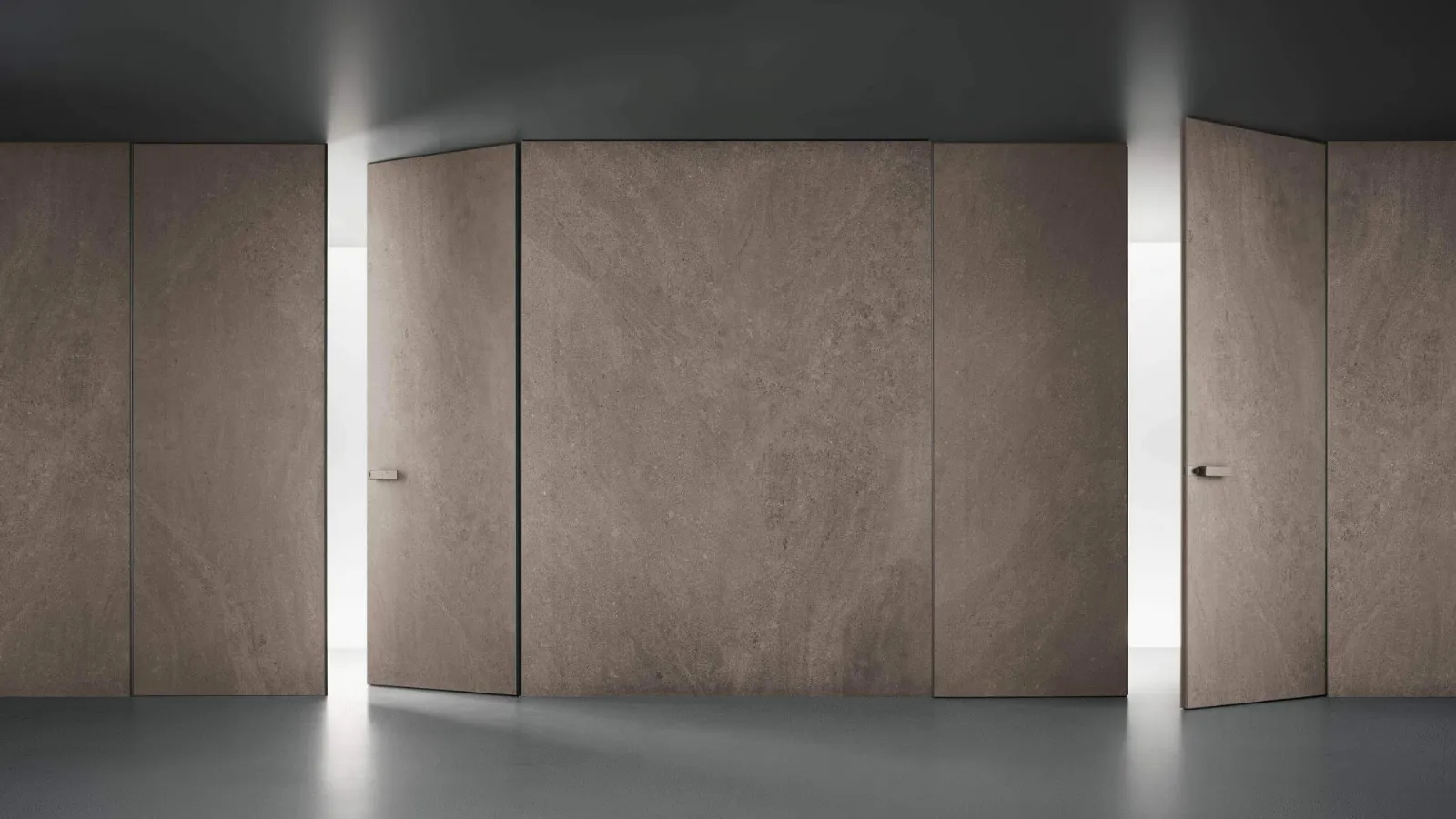 Porta a battente per interni Moon in finitura Gres Moka di Rimadesio