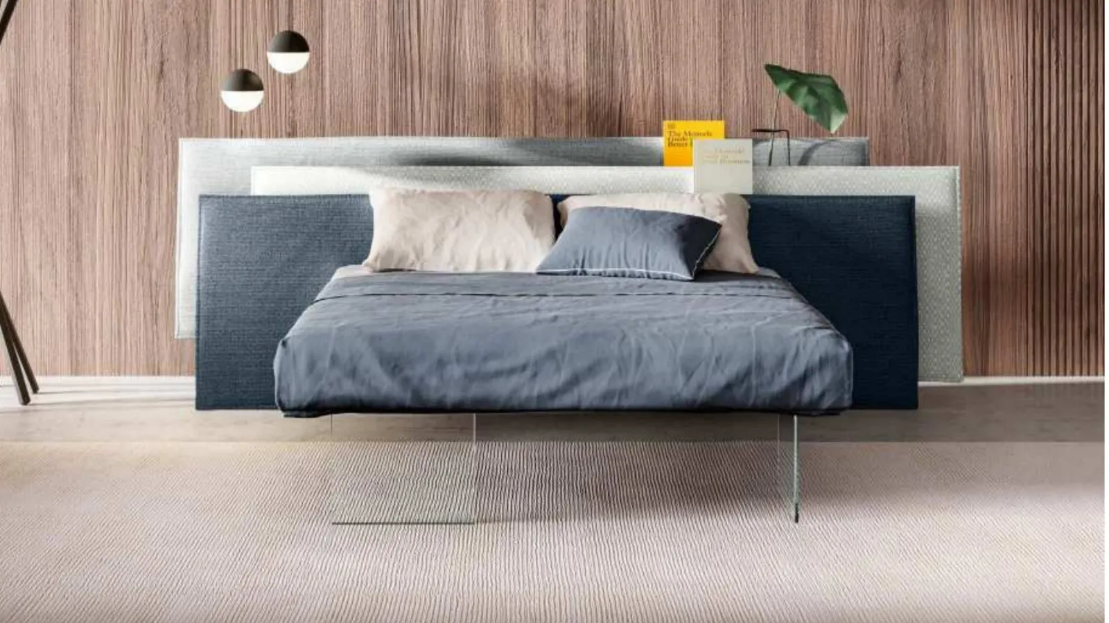 Letto con testiera formata da tre pannelli disallineati in tessuto che possono fungere da comodino Vele di Lago