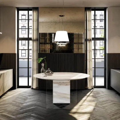 Cucina Design rotonda a isola che integra i fuochi nel piano Air Marble XGlass Calacatta Gold di Lago